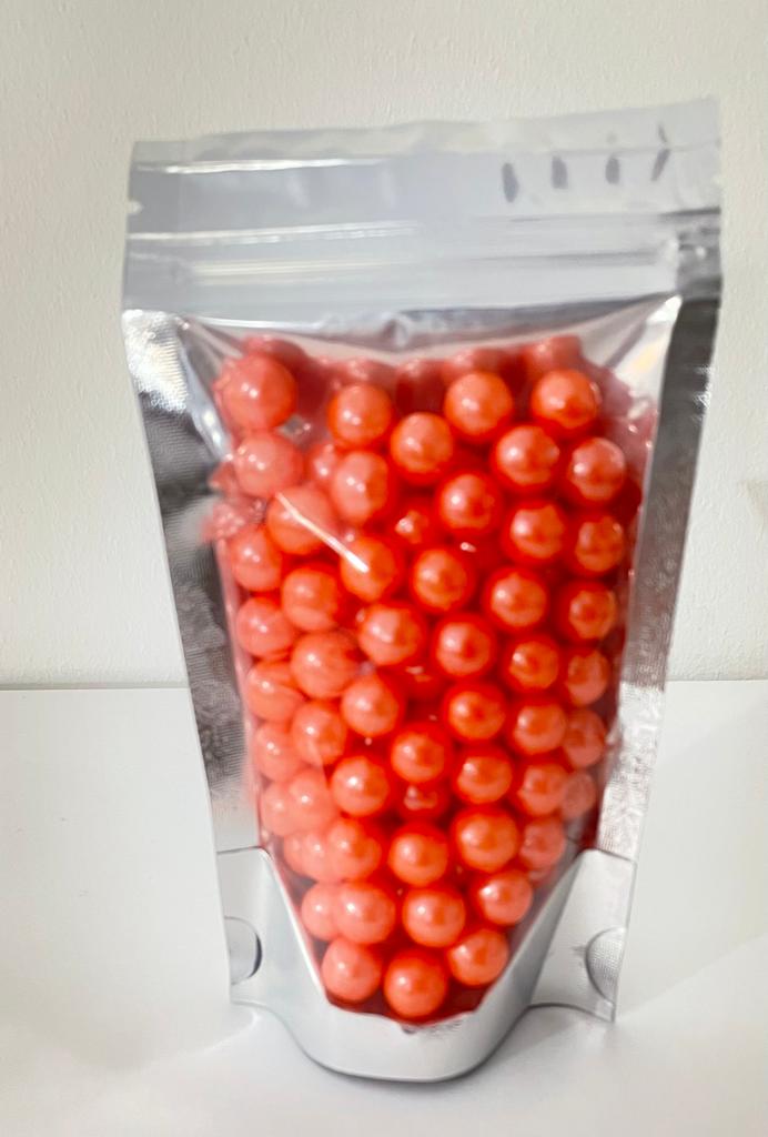 Sprinkles perla naranja 100 gr. 10 mm