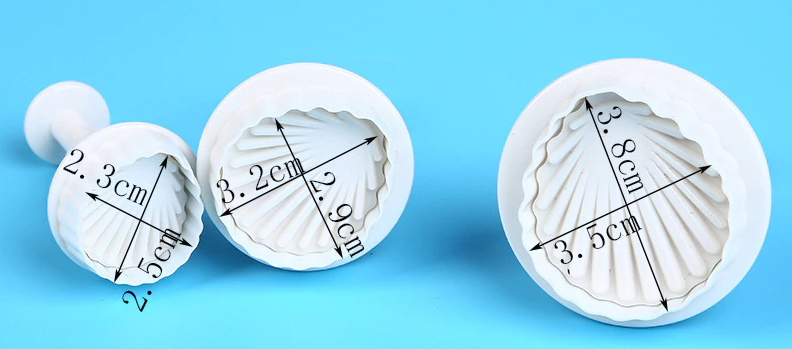 Cortador con expulsor figura concha de Mar 3 piezas