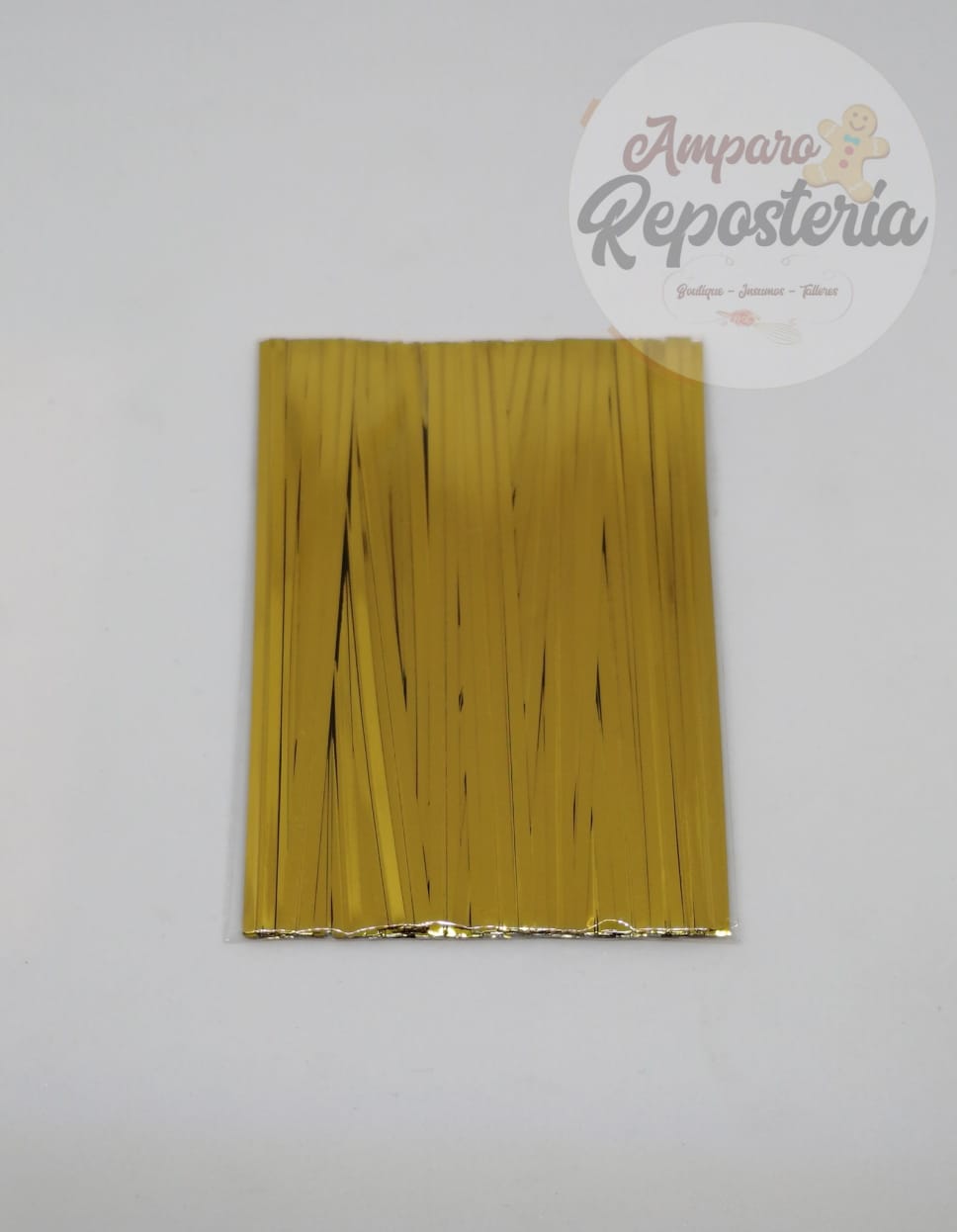 Amarras metalica dorada