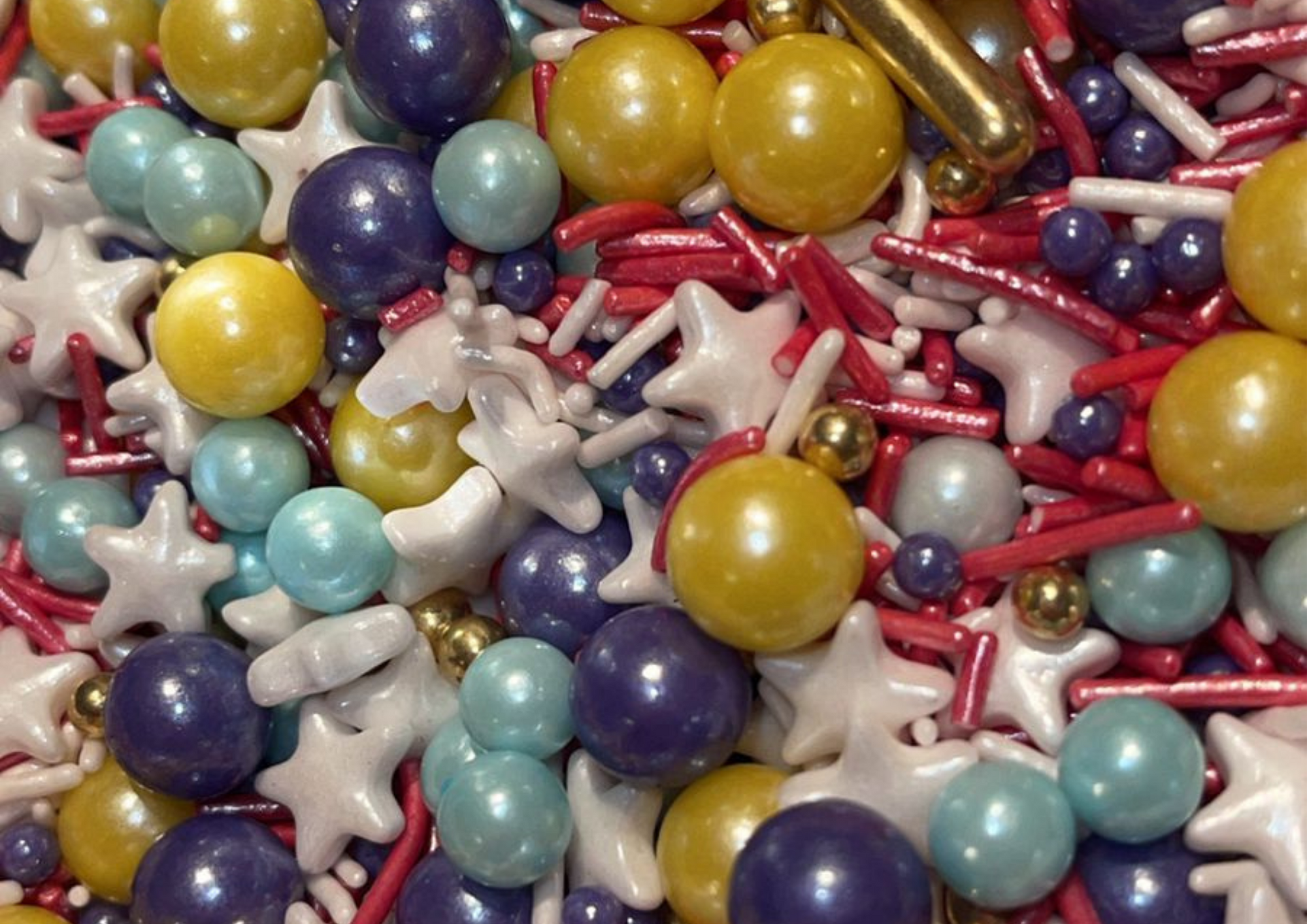 Sprinkles perlas,estrellas , palitos  100 gr