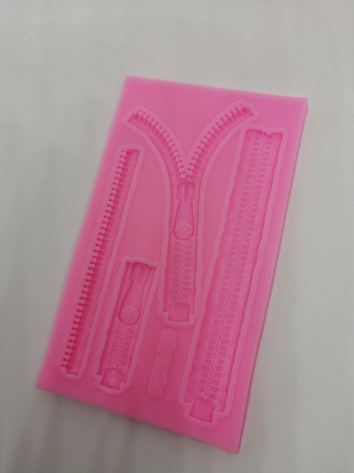 Molde silicona cierres