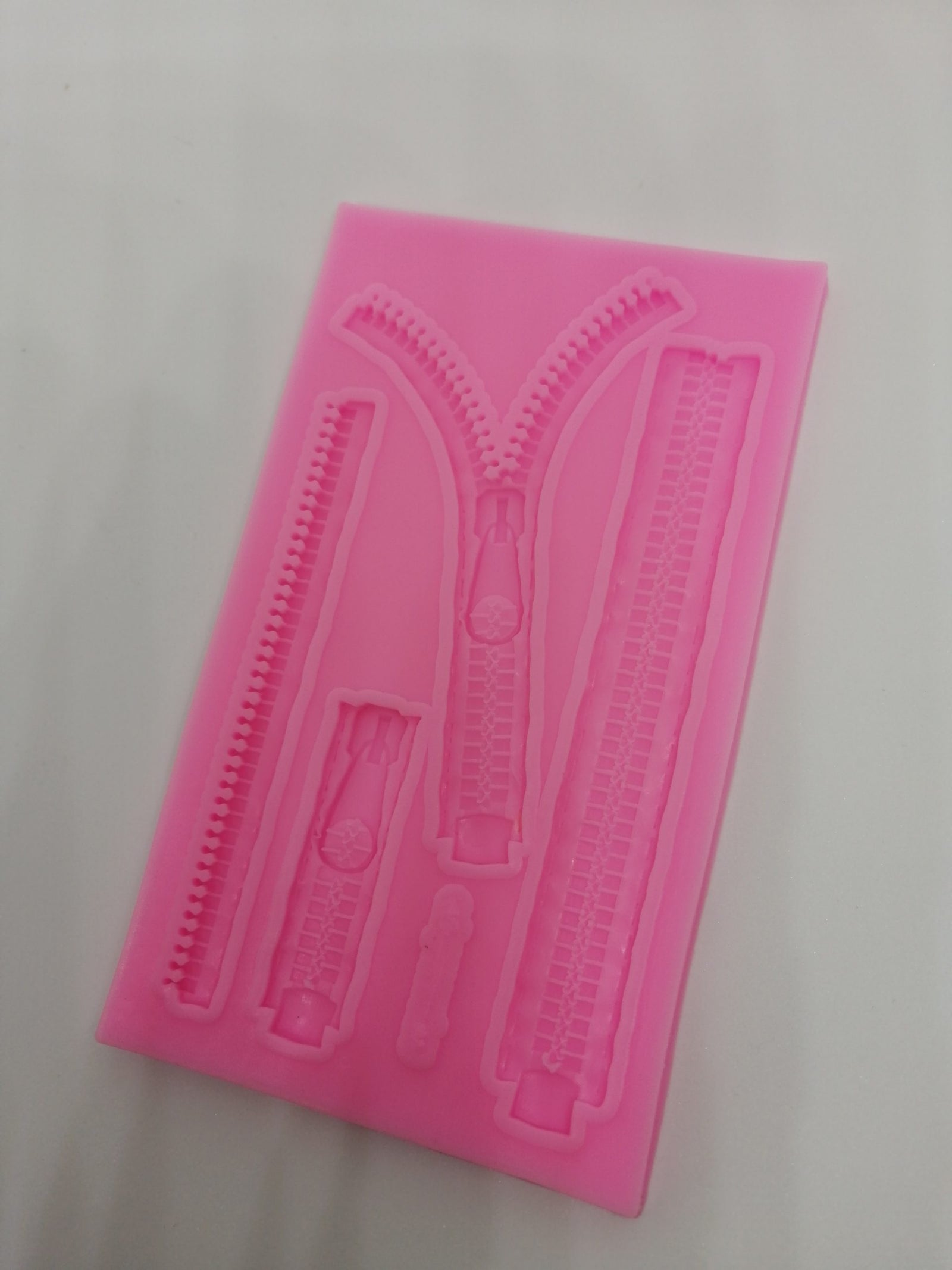 Molde silicona cierres